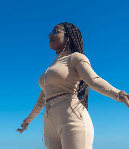 Woman celebrating healthy weight loss success