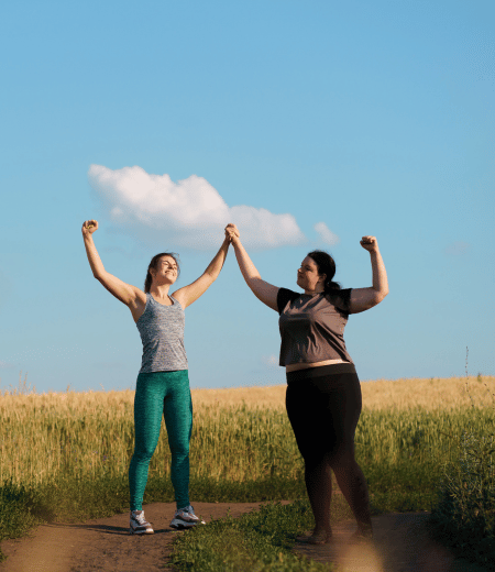 Client receiving celebrating her weight loss journey